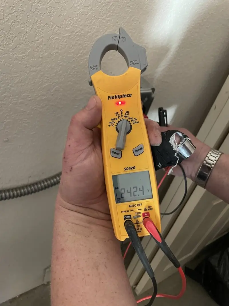 Voltage testing with clamp meter during Circuit Breaker Repair in Vernon Hills